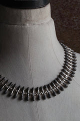 My Spot the Matchstick Necklace in oxidised silver formed from small linked 'matchstick' bars with a bobble texture