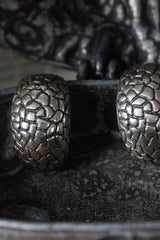 My Turtle Cup Earrings are textured with a geometric pattern and cup the base of the ear lobe
