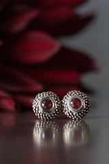 My Bobbled Pollen Stud Earrings are set with Red Garnets January's birthstones