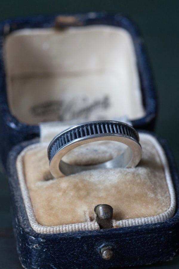 My geometric Ladder Ring has a slim band with simple striped detailing in oxidised silver and silver