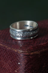 My Small Textured Band Ring has a textured wide band between two smooth silver bands