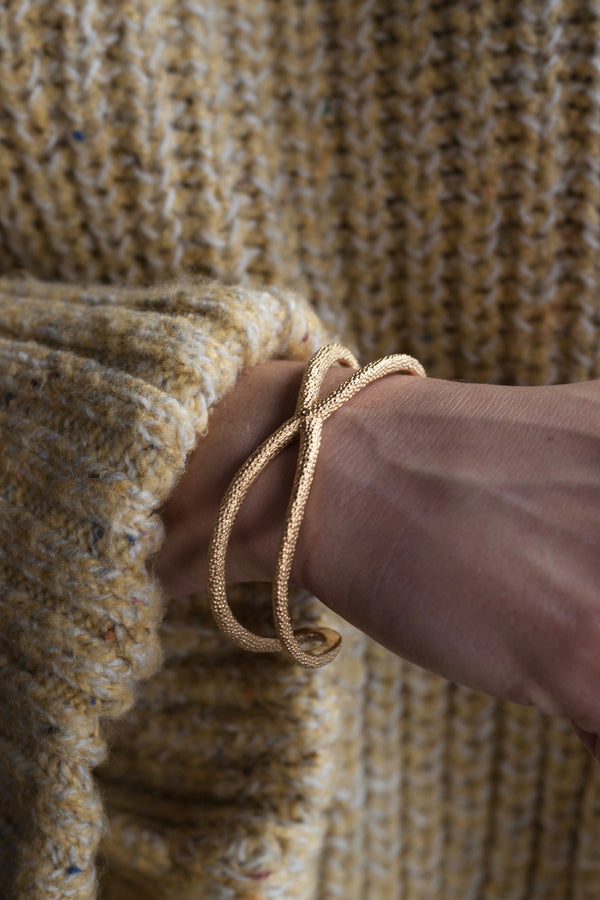 My Starfish Bangle worn in gold plated silver takes a sculptural shape inspired by dried starfish