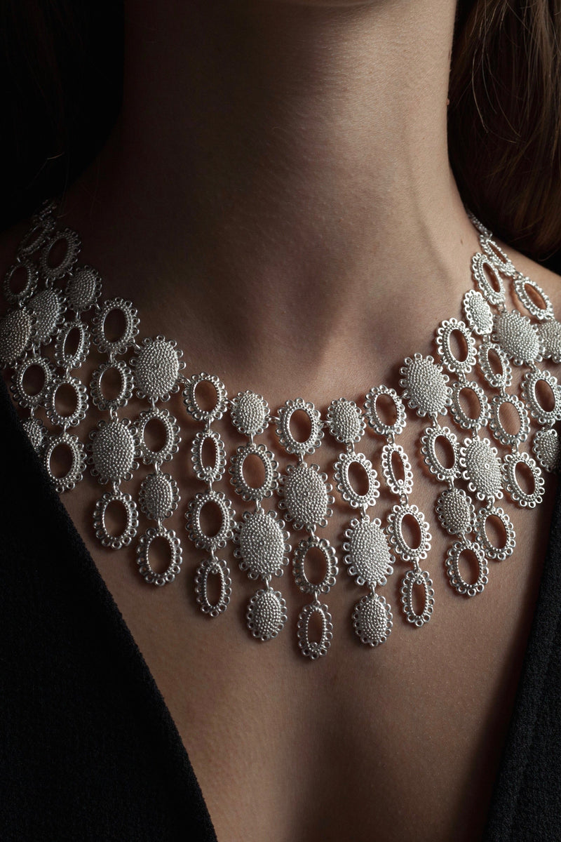 My Large Baroque Collar Necklace worn by a model, inspired by antique lace and ruffs, adds drama to any outfit 