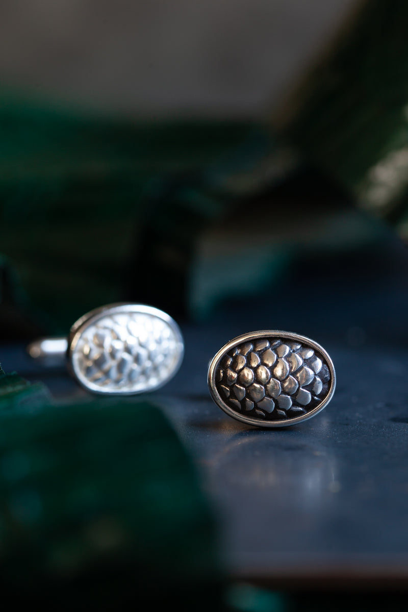 A bold and modern cufflink design inspired by the texture of snake skins