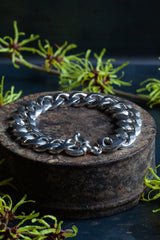 chunky men's chain link bracelet, finished with a circular closure