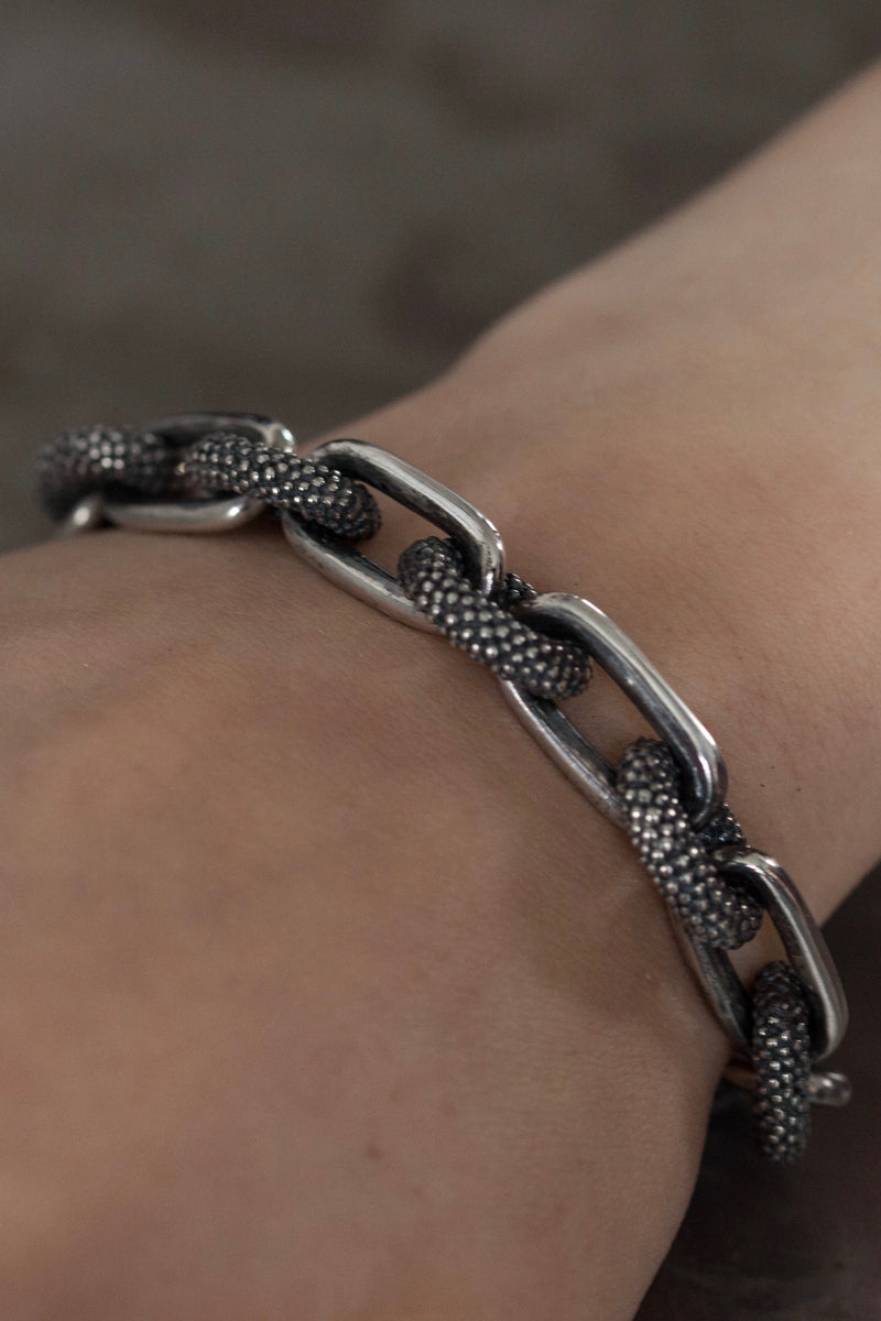 My chunky Spotted Oval and Plain Link Bracelet worn in oxidised silver