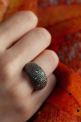 My chunky Diamond Bubble ring is textured with tiny beads of silver with 7 diamonds worn by model