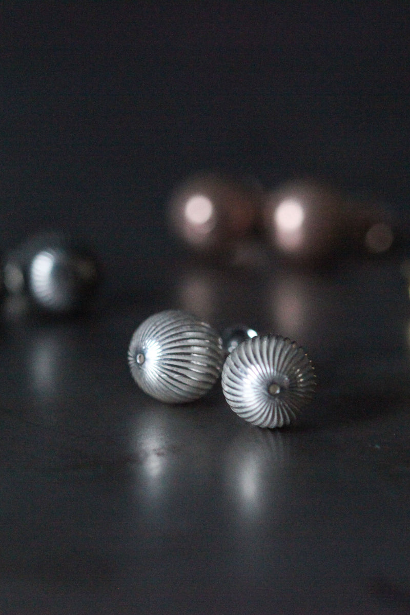My Bauble Earrings have a fine striped texture to catch the light