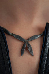 Close up of my Petal Necklace in oxidised silver with two petals as a focal point