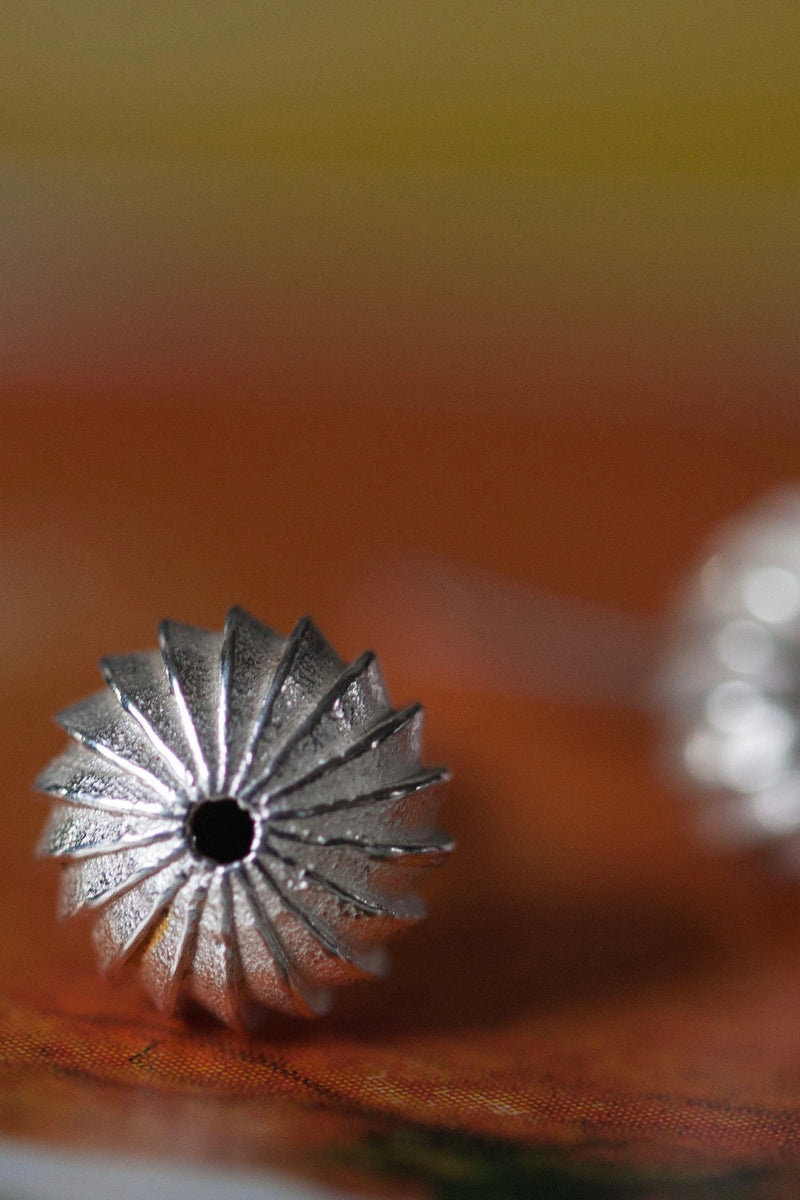 My Clementine Stud Earrings feature a delicate striped texture to catch the light