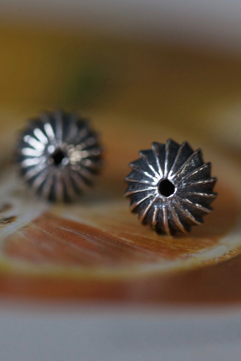 My Clementine Stud Earrings feature a delicate striped texture to catch the light