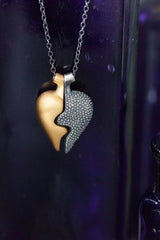 Close up of my Chunky heart shaped pendant half gold plated silver and half oxidised silver