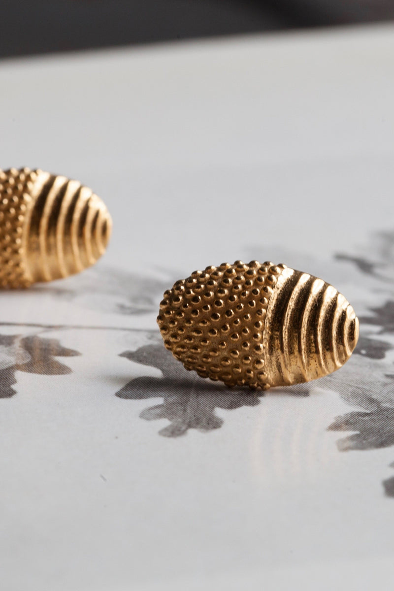 My Spotted Acorn Stud Earrings are half embellished with a spotted texture and half with contrasting striped cups