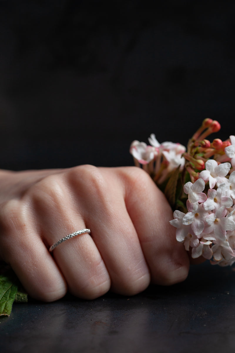 My Mini Bobbled Stacking Rings worn in silver are textured rings that can be worn alone or stacked with others