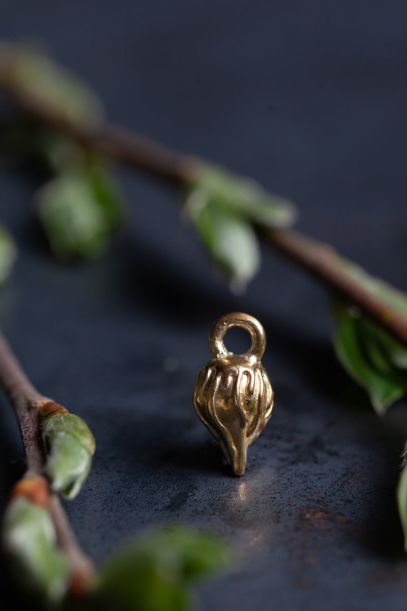 My Melting Droplet Charm is a pleasing tear drop shape adorned with a texture like molten metal.  