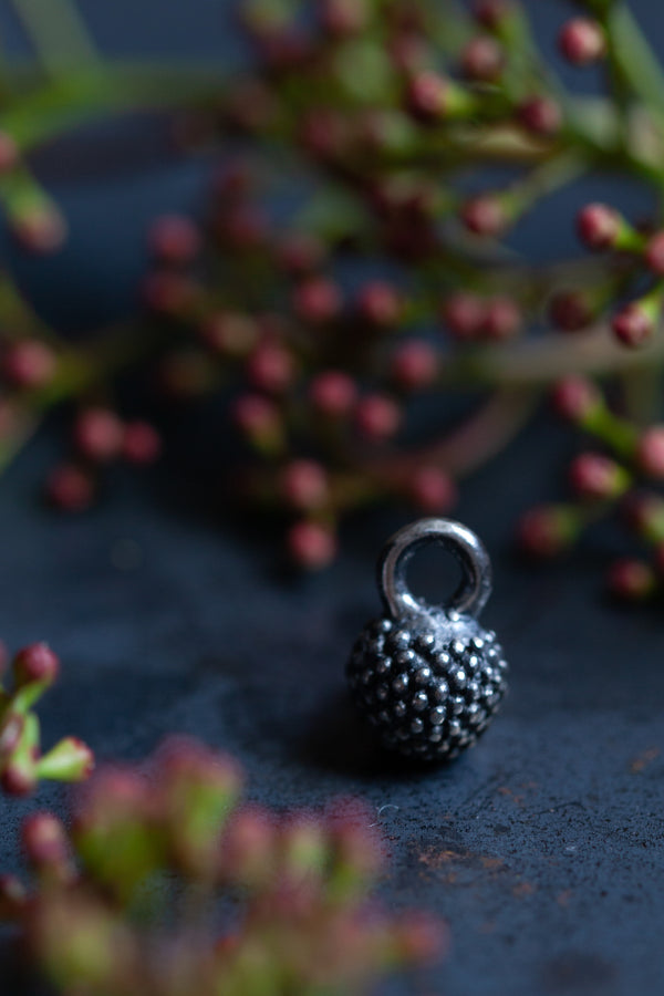 My Mimosa Charm is a ball shaped charm, inspired by the subtle texture of mimosa flowers