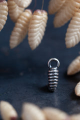 My Pupa Charm, inspired by bee hives, has pleasing stripes that catch the light 