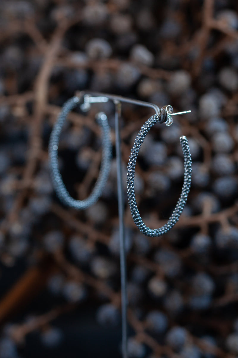 My Elliptical Hoop Earrings are oval in shape and made from detailed beaded wire