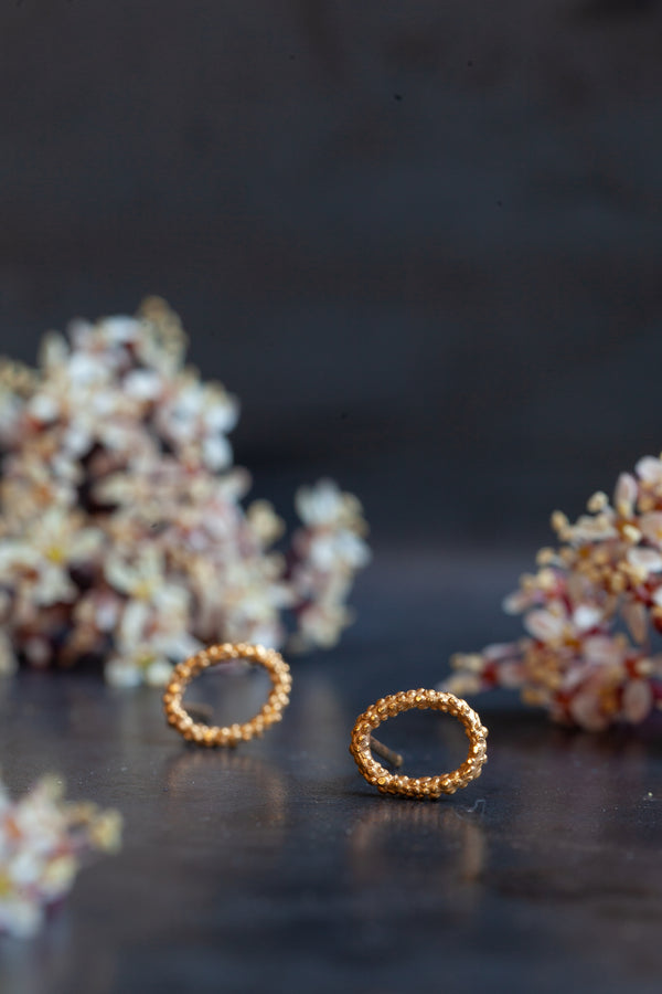 My Tiny Oval Hoop Earrings are timeless studs with a bobbled texture