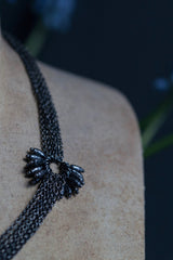 My Rice Pearl Necklace in oxidised silver features two flowers made from rice pearl beads