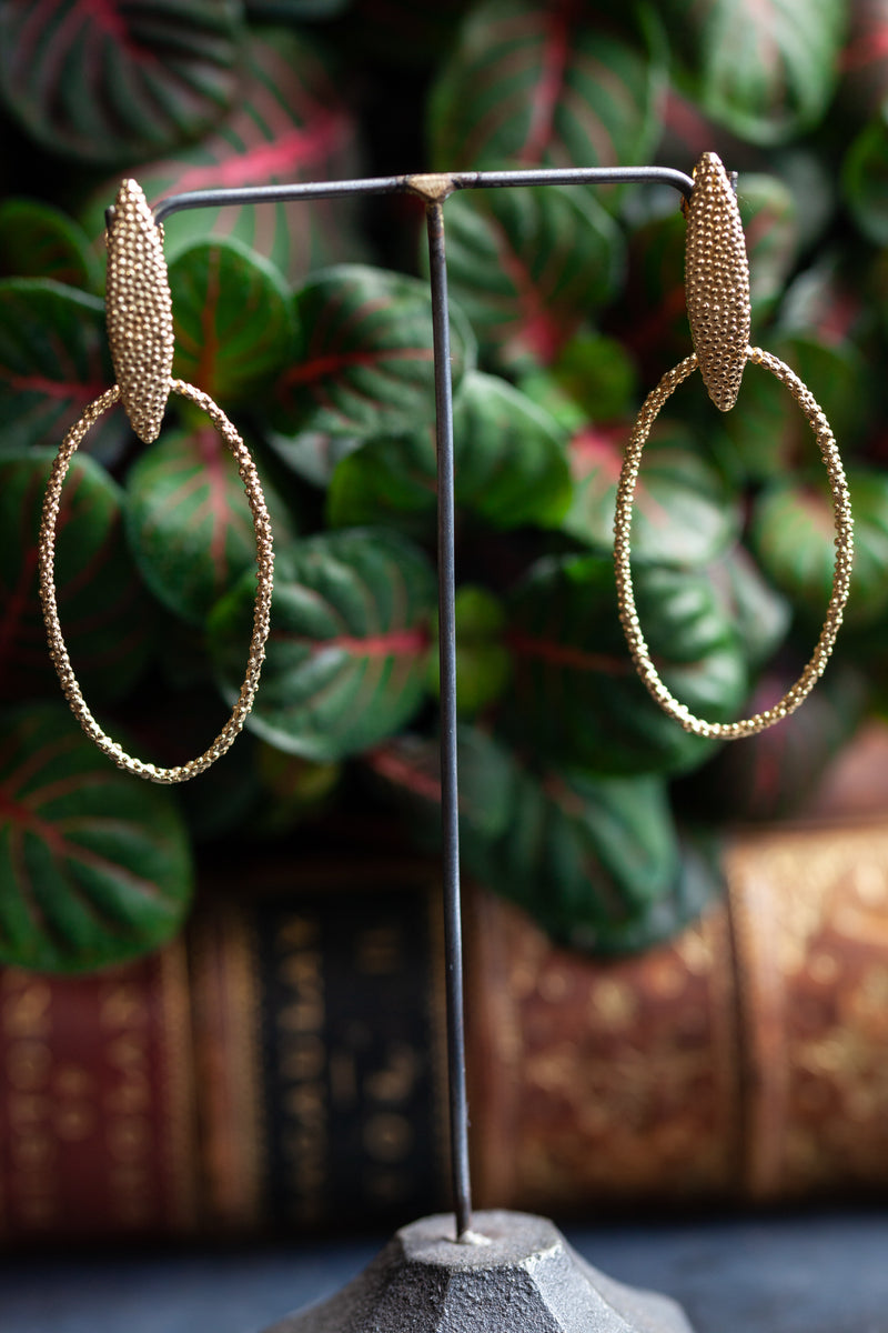 My Petal Oval Hoop Earrings combine bobbled textured oval hoops with a petal stud 