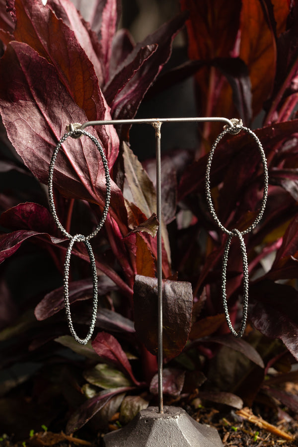 My Double Oval Bobbled Hoop Drop Earrings feature two textured ovals that sit just below the jaw line