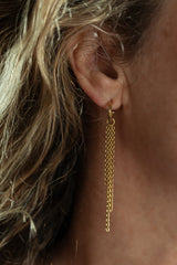 My Three Chain Drop Earrings worn by a model in gold plated silver