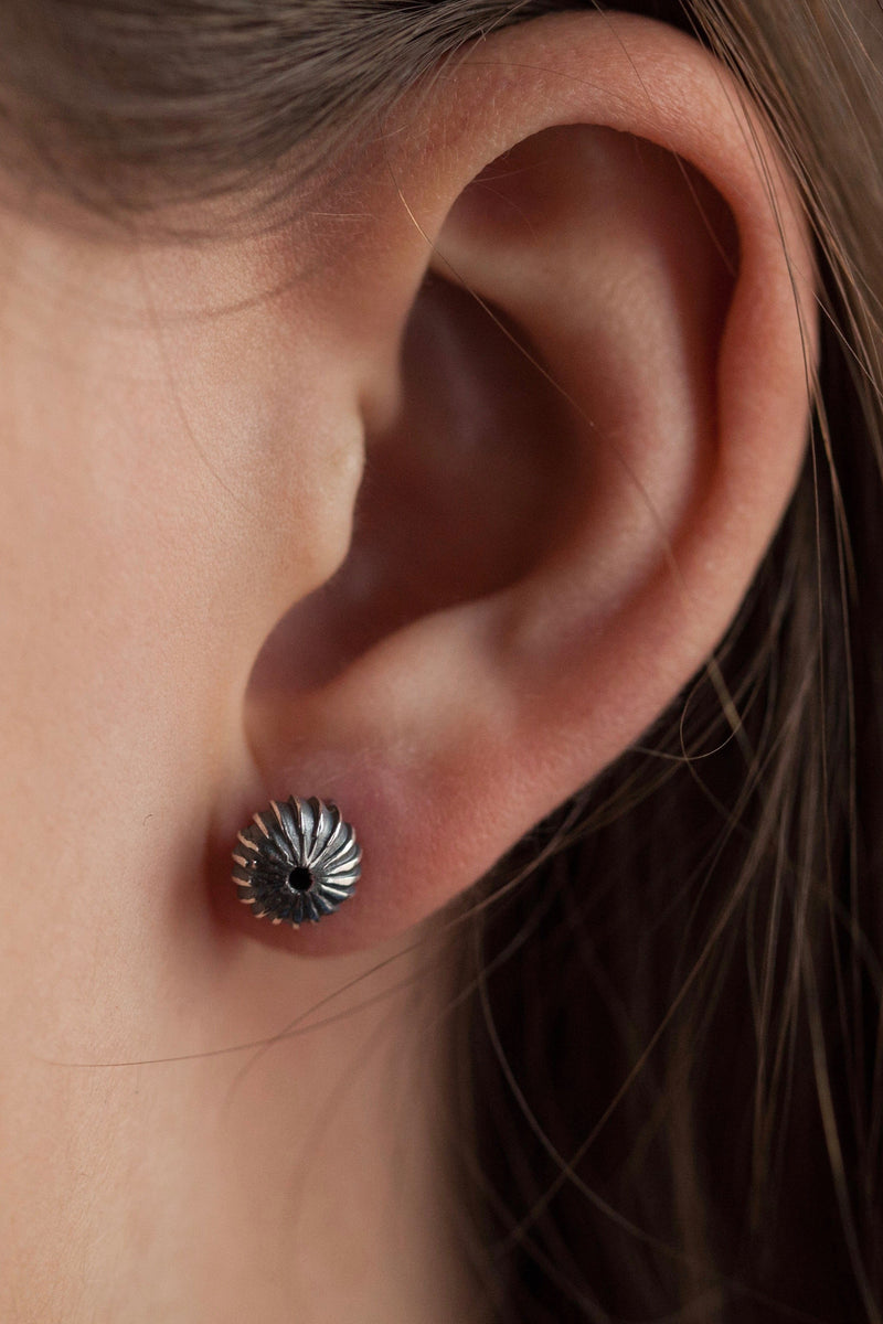 My Clementine Stud Earrings worn by a model in oxidised silver