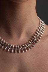 My Spot the Matchstick Necklace worn in silver formed from small linked 'matchstick' bars with a bobble texture