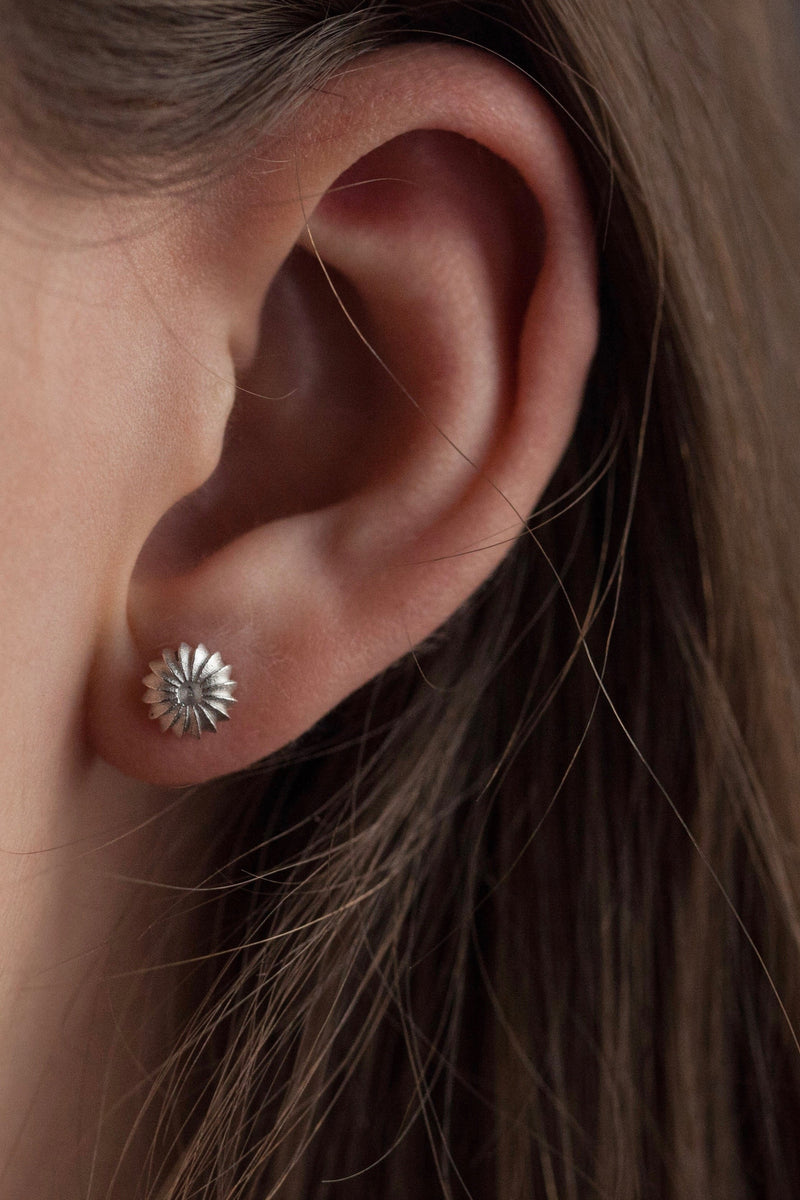 My Satsuma Studs are decorated with subtle stripes that catch the light worn in silver