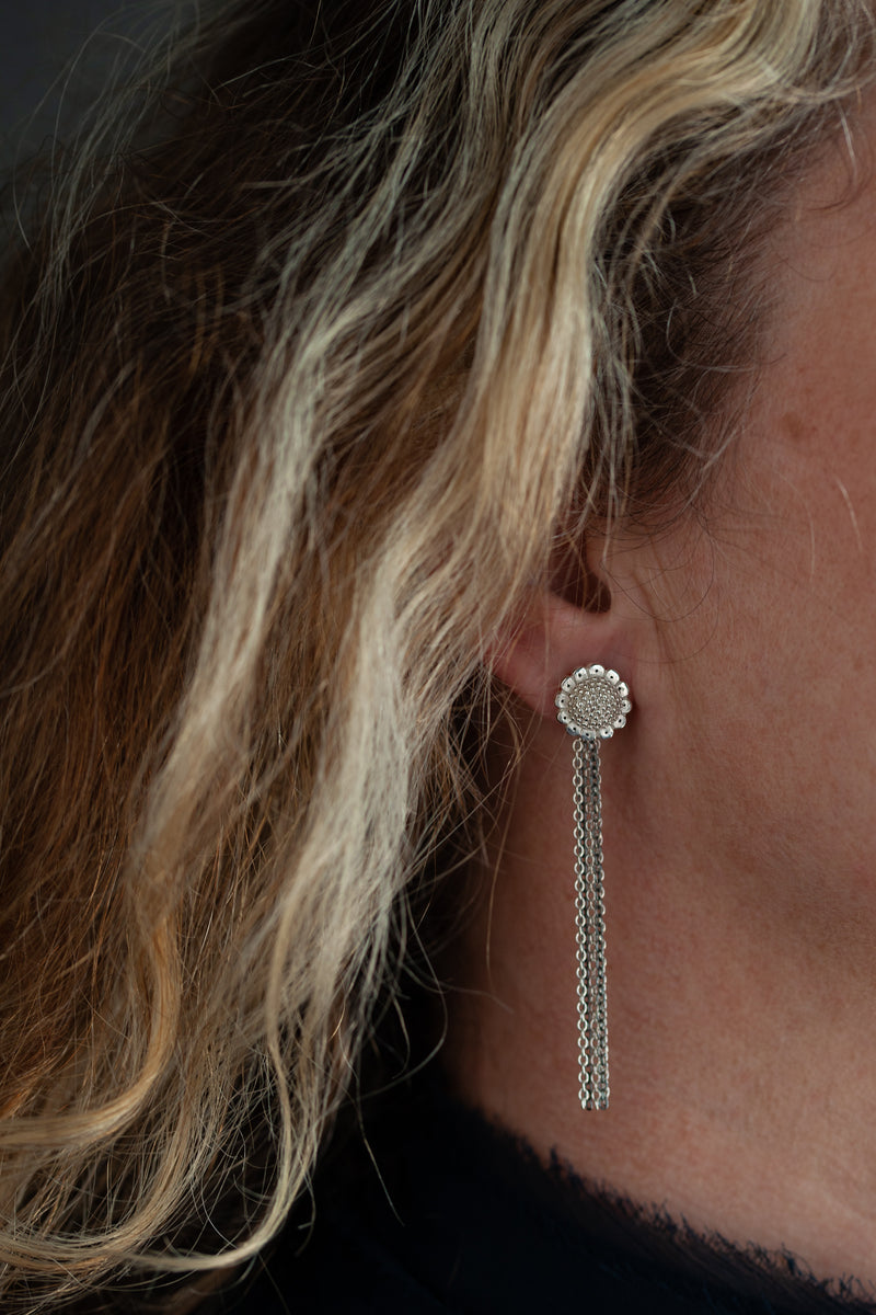 My Sunflower Studs with Detachable Chains worn by a model in silver