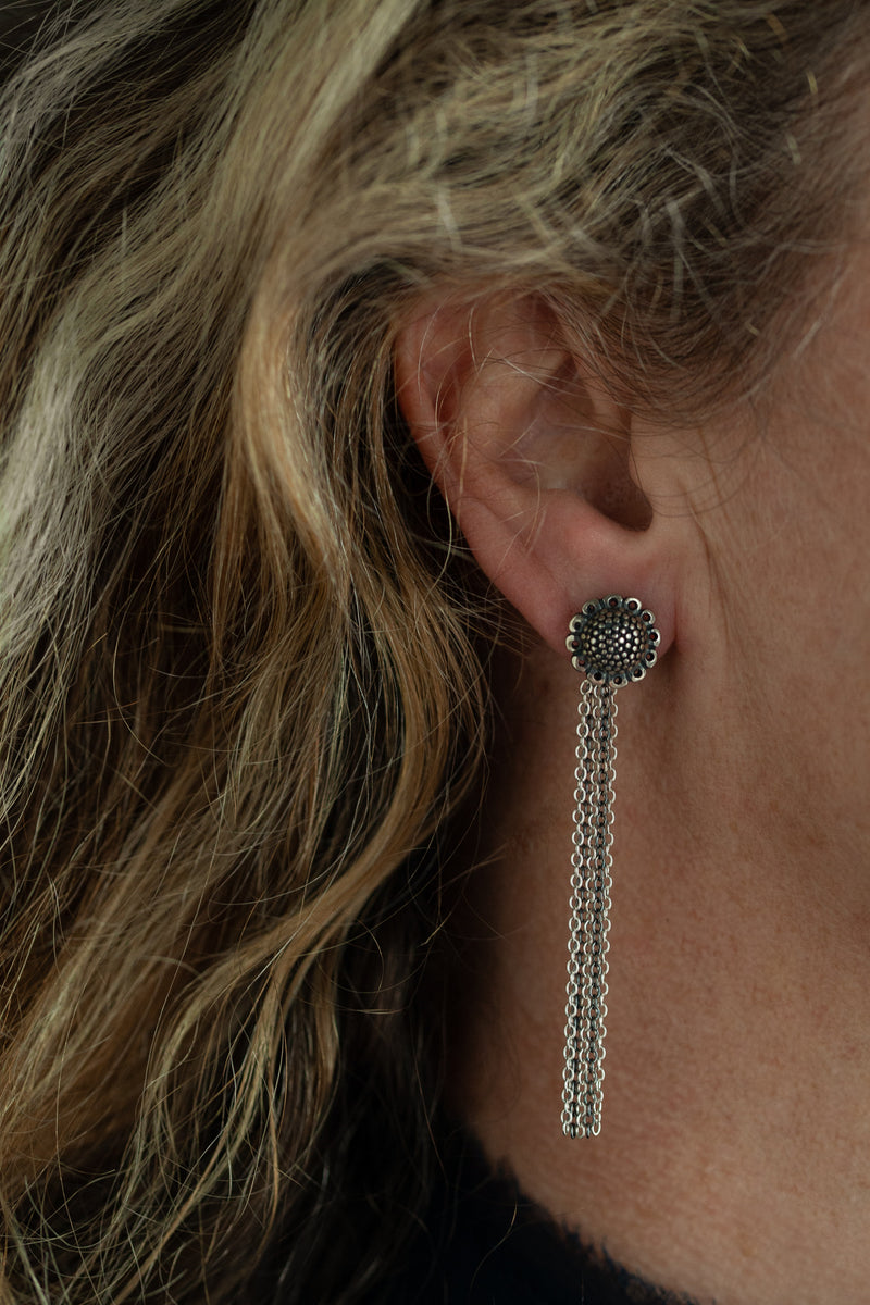 My Sunflower Studs with Detachable Chains worn by a model in oxidised silver