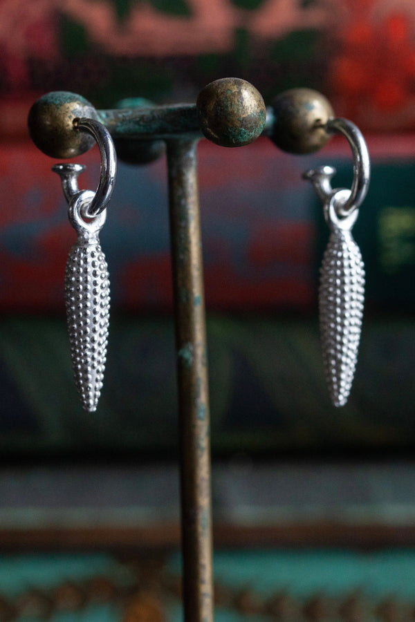 My Spot the Carrot Drop Earrings are inspired by seeds and nature