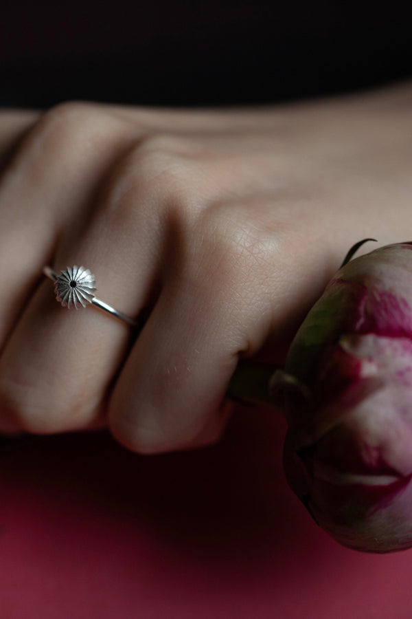 My Clementine Stacking Ring has an elegant striped centrepiece inspired by the fruit worn in silver