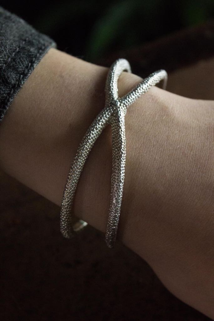 My Starfish Bangle worn in silver takes a sculptural shape inspired by dried starfish