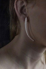 My Phish Drop Earrings worn by a model in silver