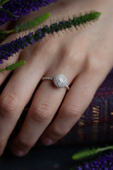 My Bobbled Pollen Stacking Ring worn by a model in silver