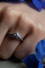 My Trio Sapphire Cabochon Cluster Ring worn in oxidised silver  features 3 gemstones in 'rub over' settings