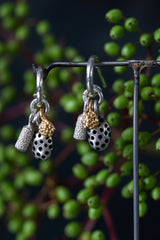 My Trio Pod Drop Earrings are hung with three different seed pod inspired charms