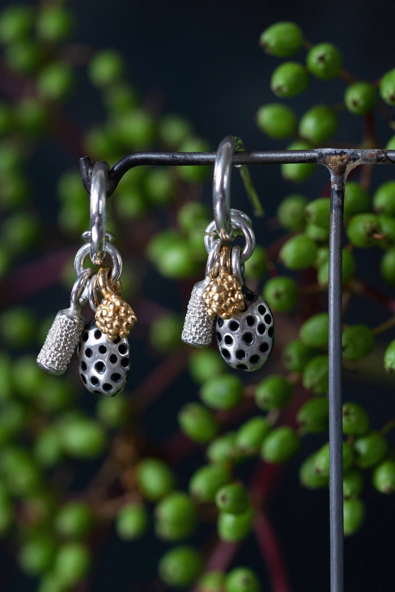 My Trio Pod Drop Earrings are hung with three different seed pod inspired charms