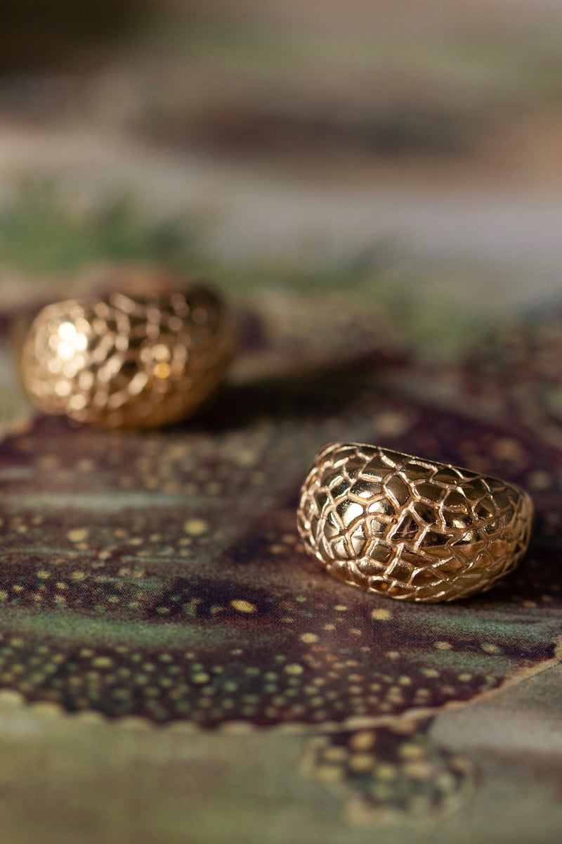 My Turtle Cup Earrings are textured with a geometric pattern and cup the base of the ear lobe