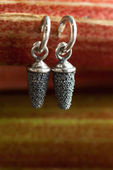My Textured Pod Drop Earrings, hung with a charm, were worn in a Harry Potter film