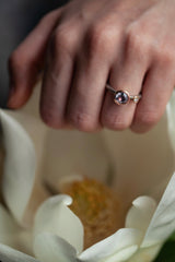 A one off Blue Spinel in 18ct yellow gold cup setting with a white diamond on 18ct yellow gold band 