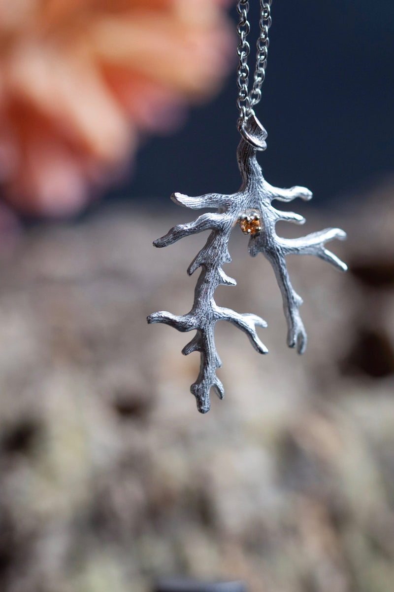 My unusual branch pendant, set with an orange Spessartite Garnet, January's birthstone
