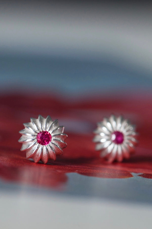 My July Ruby Birthstone Satsuma Studs are subtly striped and set with gemstones