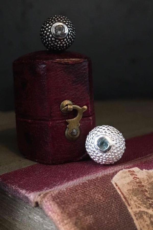 A special birthstone pendant for June - a tactile textured ball with a glistening Alexandrite at the base