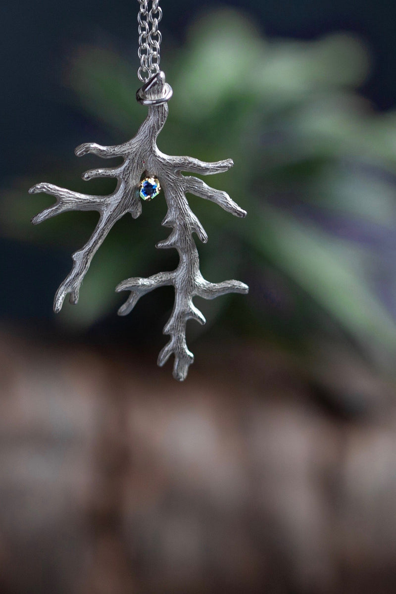 My branch pendant, with a Blue Tourmaline October's birthstone, on a delicate trace chain