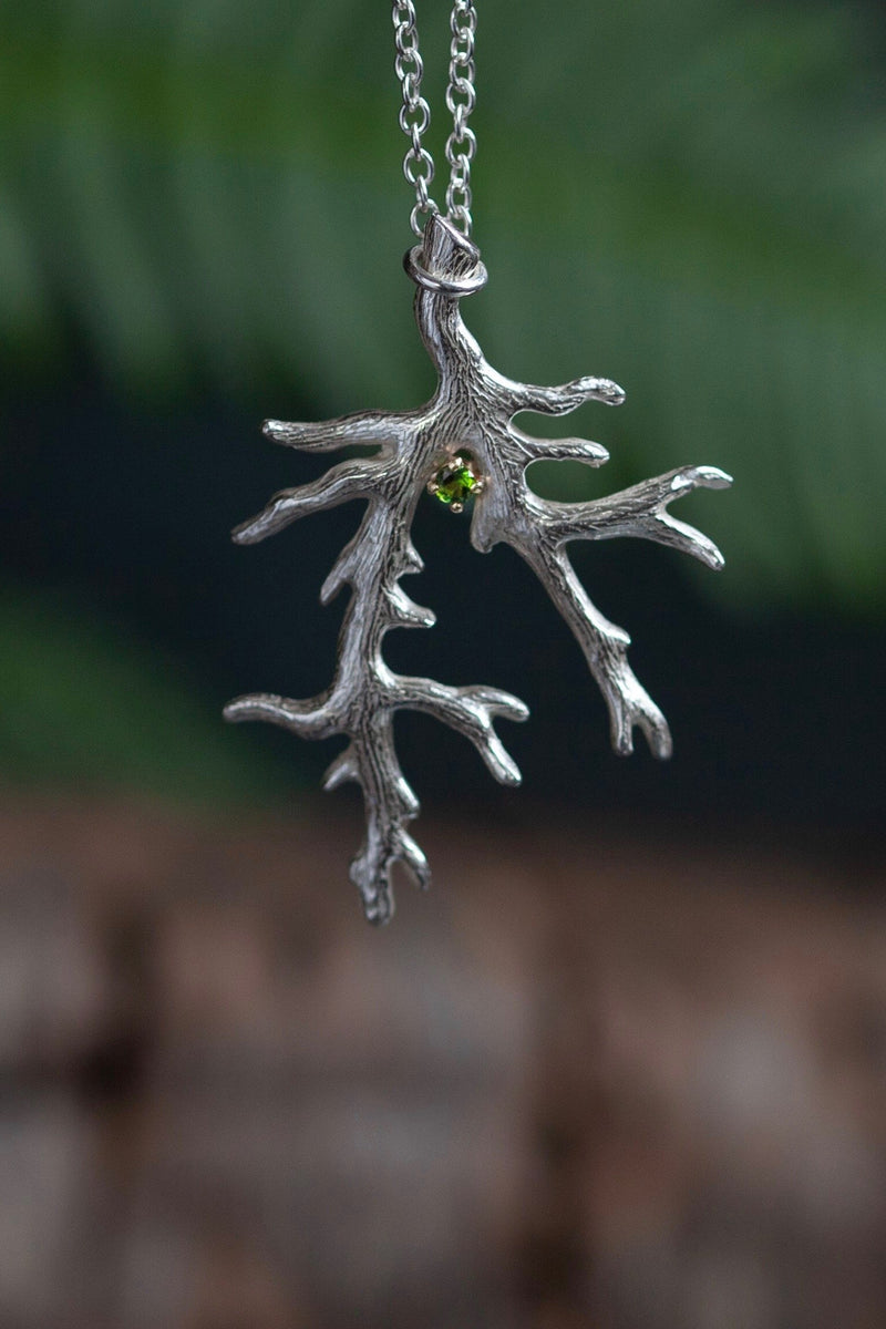 My branch pendant, with a Green Tourmaline October's birthstone, on a delicate trace chain