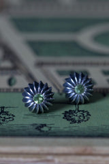 My October Green Tourmaline Birthstone Satsuma Studs are subtly striped and set with gemstones