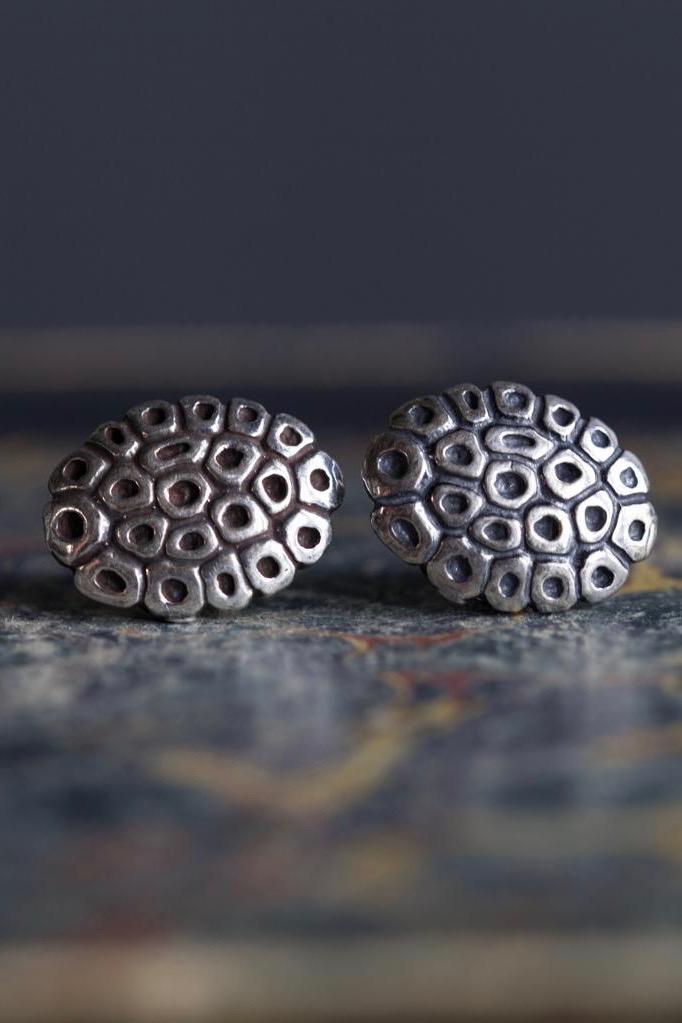 My Turtle Earrings are oval studs with a geometric turtle shell design 